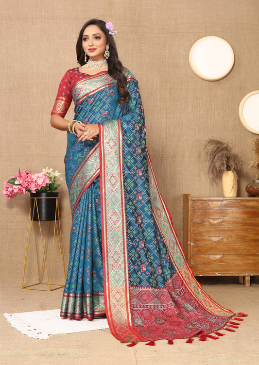 luxurious designer Women's Soft  Patola  silk saree with Meenakari  zari weawing motifs  and Rich Zari weawing silk saree